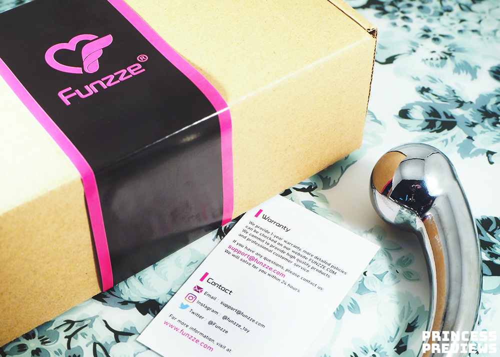 Funzze Stainless Steel Dildo with packaging and warranty card